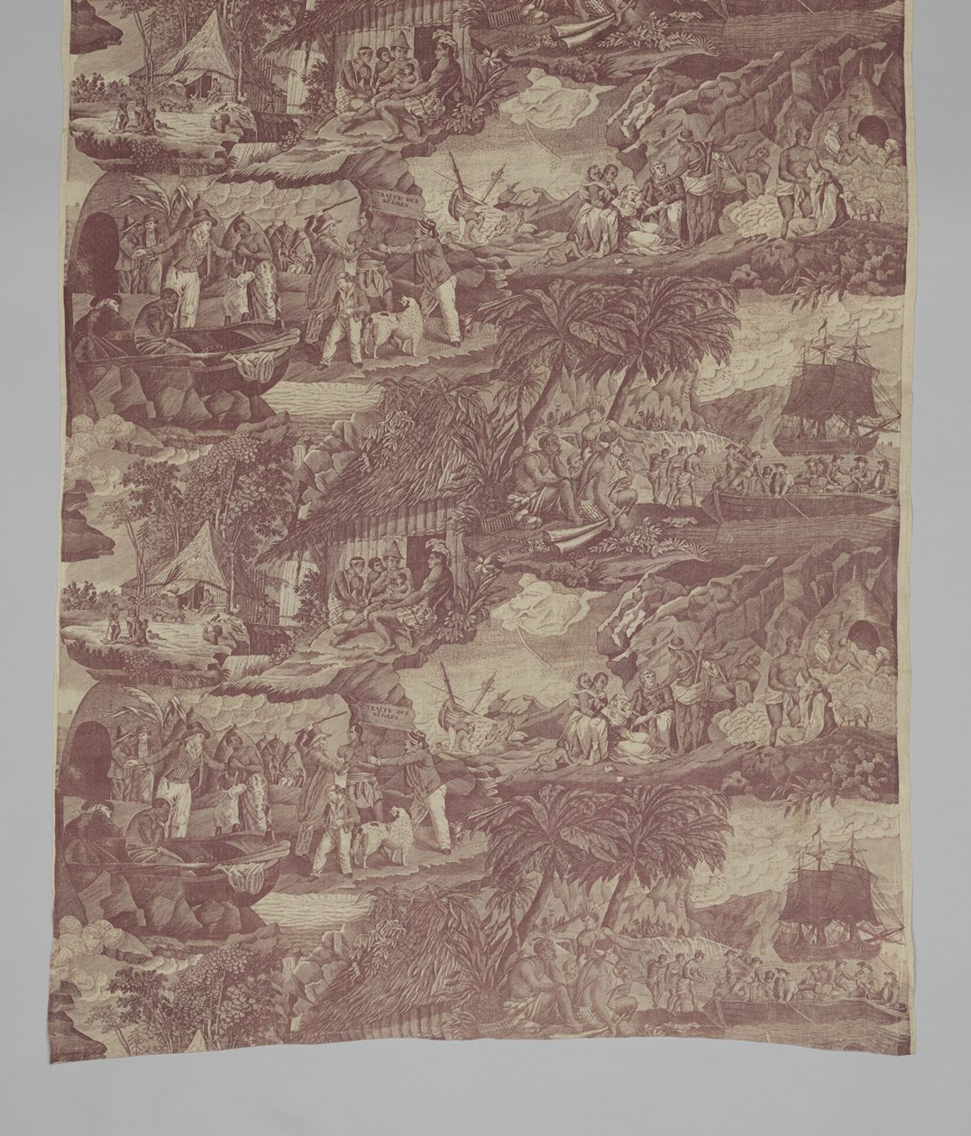 Printed cotton with repeated scenes of African families and European slave traders.