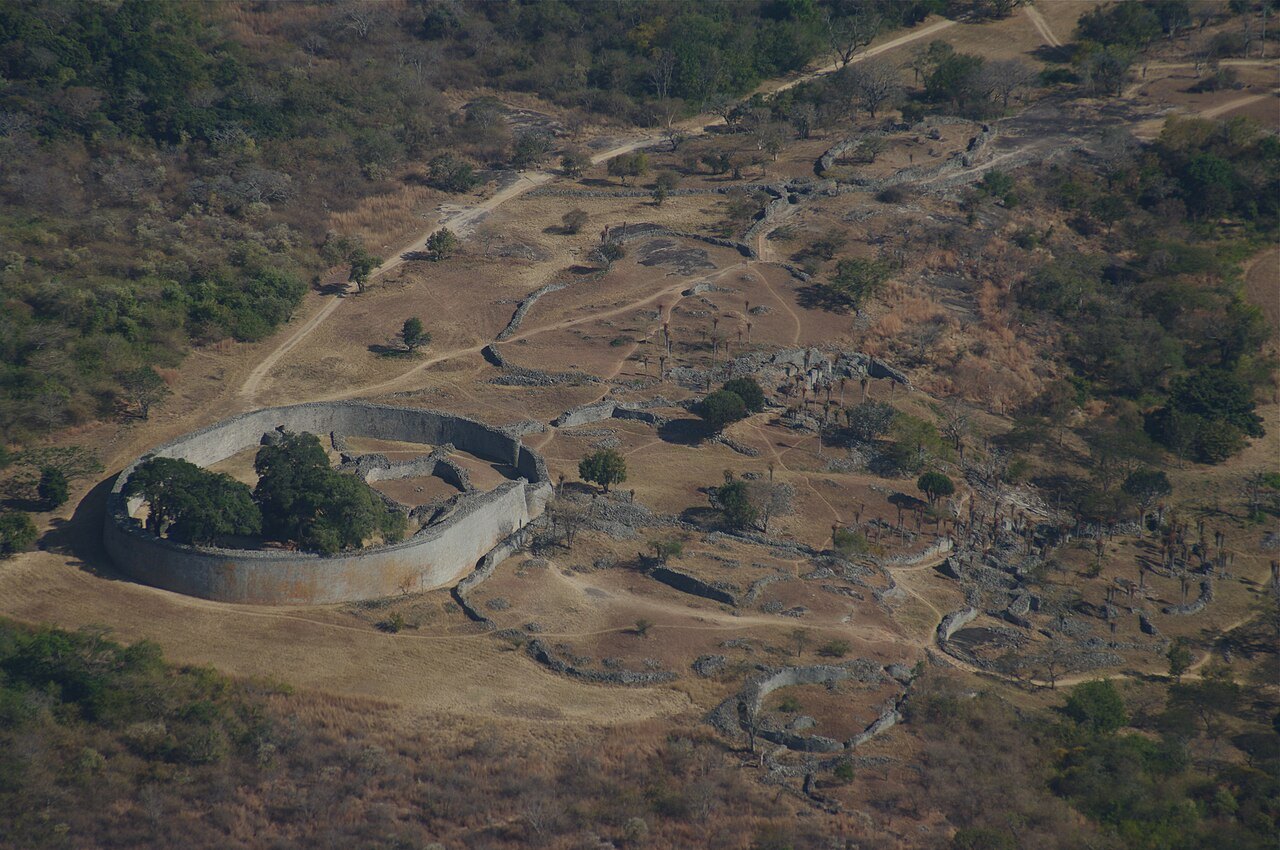 A view of the oval stone enclosure and surrounding ruins.
