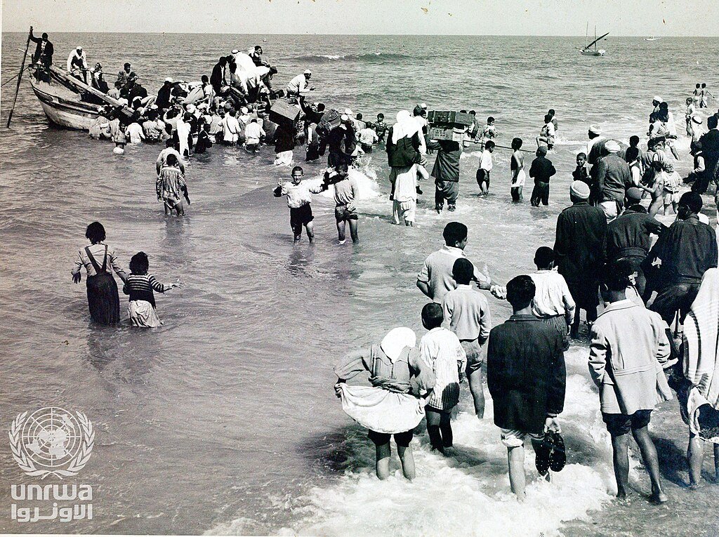 Palestine refugees travelling by fishing boat