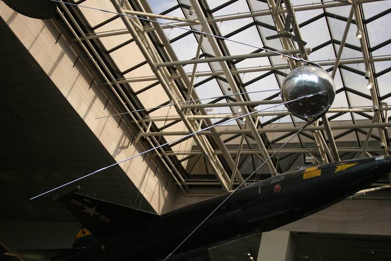 A museum display of a replica of the Sputnik 1 satellite.