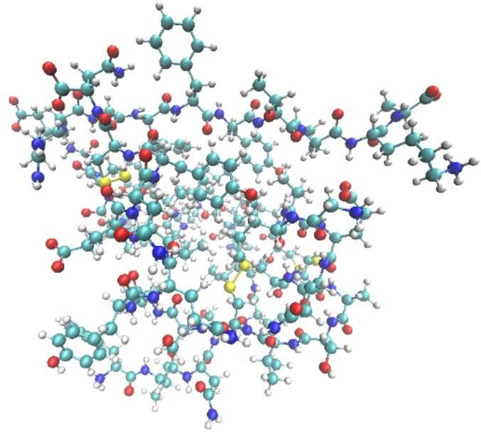 A three-dimensional model of bovine insulin with atoms shown in different colours.
