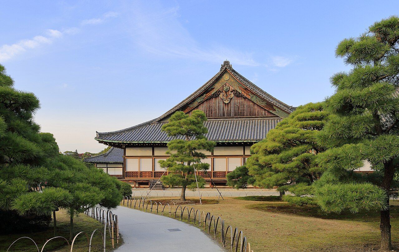 Ninomaru Palace with layered tiled roofs and an ornate entrance.